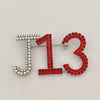 J13 Brooch